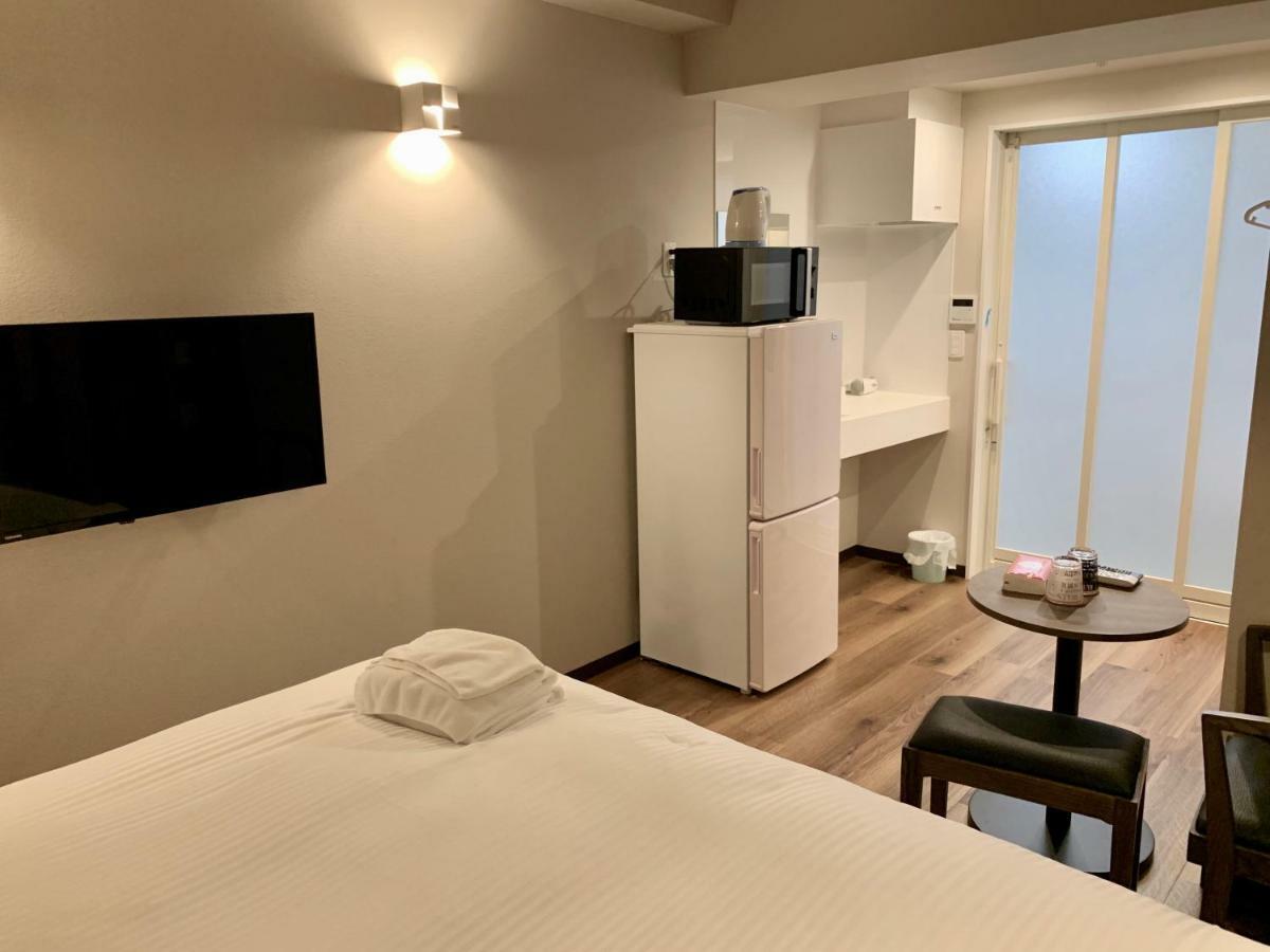 Mr.Kinjo Inn Sky Harbor Наха Экстерьер фото